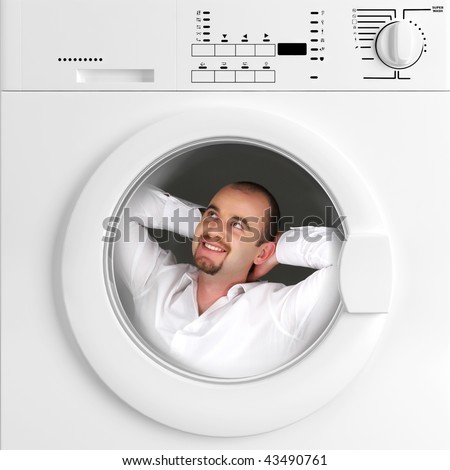 young man has relax time inside of washing machine, metaphoric image