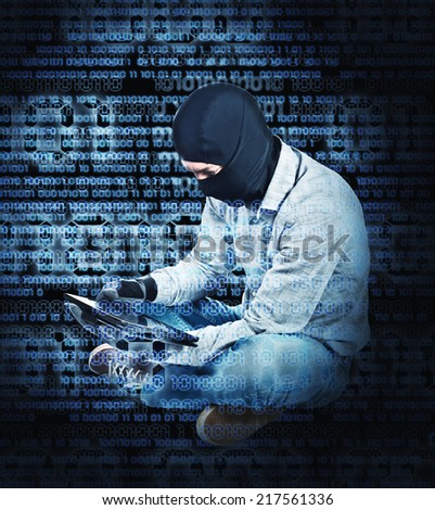hacker with tablet and abstract background