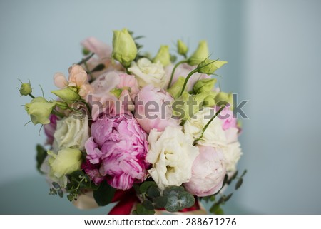 a bouquet of peonies