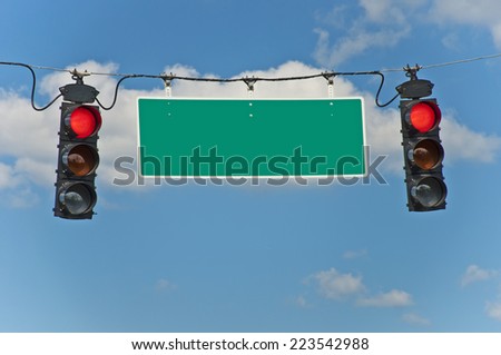 Red Stop Lights With Blank Traffic Sign