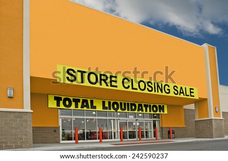 Brightly Colored Store Closing Sale Sign On Building