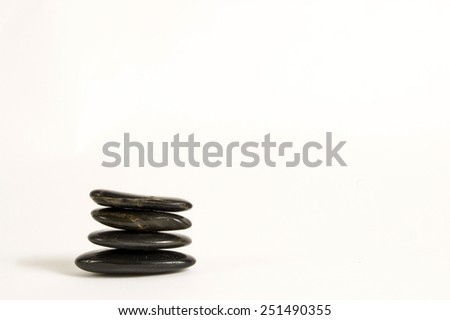 Balanced Zen Stones On White Background