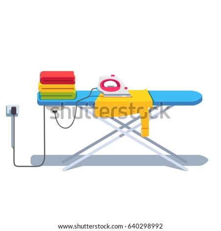 Ironing board with clothes stack and shirt under socket plugged electric iron. Flat style vector illustration isolated on white background.