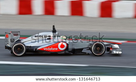 BARCELONA - FEBRUARY 19: Sergio Perez of Vodafone McLaren Mercedes F1 team at Formula One Test Days at Catalunya circuit on February 19, 2013 in Barcelona, Spain.