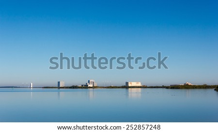 [2014-12-14]Cape Canaveral Air Force Station, Florida. Solid Motor Assembly Building, Vertical Integration Building, Launch Complexes LSC-37, LSC-40 and their reflections on banana river are visible.