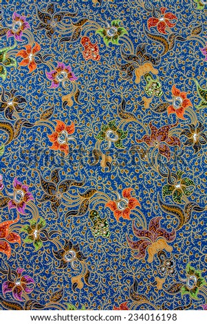 Batik design in Thailand for traditional clothes. Colorful blue tone background and flower style. For creator design illustrator.