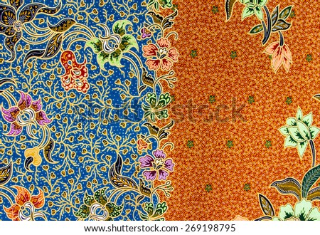 Batik design in Thailand for traditional clothes. Colorful orange tone background and flower style. For creator design illustrator.