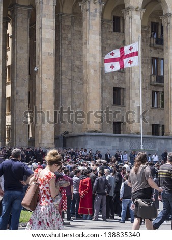 TBILISI, GEORGIA - MAY 17: People connected with the Georgian Orthodox Church protest against the May 17 demonstration for the International Day Against Homophobia on Rustaveli Avenue on May 17, 2013.
