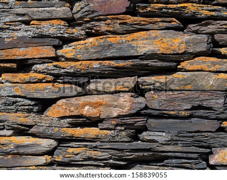 Wall built from shale stones, typical built material in Tusheti, Georgia.