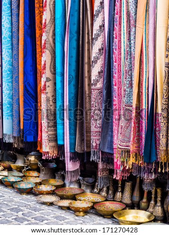 Colorful scarves and other souvenirs sold on a local market in Baku, Azerbaijan.
