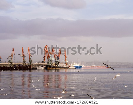 BAKU, AZERBAIJAN - NOVEMBER 22, 2013: Baku International Marine Trade Port at sunset.