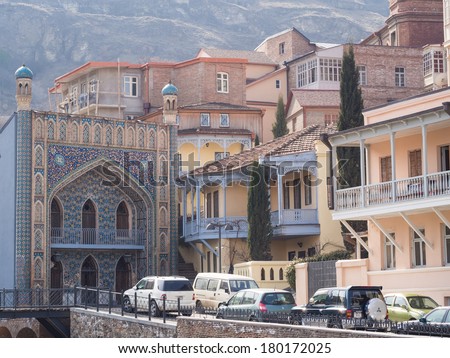 TBILISI, GEORGIA - MARCH 01, 2014: Horizontal photo of the architecture (Jumah mosque, carved balconies) of the Old Town in Tbilisi, Republic of Georgia, in Abanotubani area, next to the sulphur baths