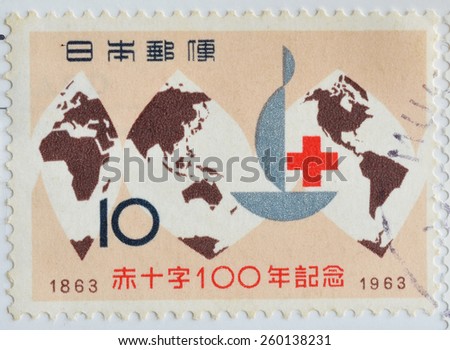 JAPAN - CIRCA 1963 : postage stamp printed in Japan shows the century anniversary of world map International red cross, circa 1963