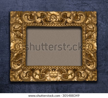 vintage gold picture wood retro frame on a black background wall