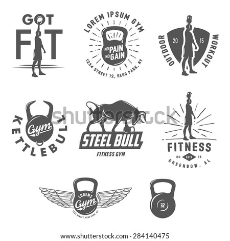 Set of vintage fitness crossfit emblems and design elements