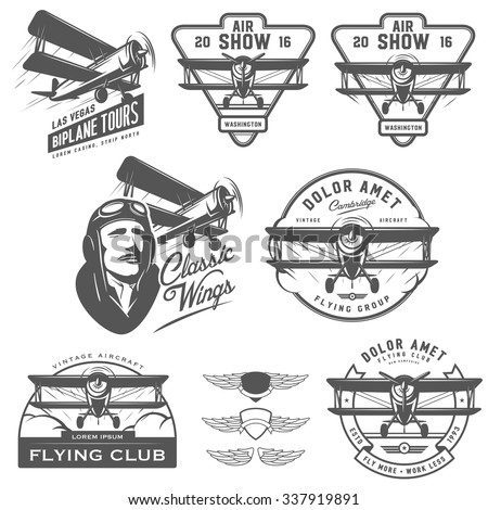 Set of vintage biplane emblems, badges and design elements
