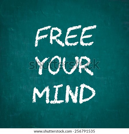 FREE YOUR MIND written on chalkboard