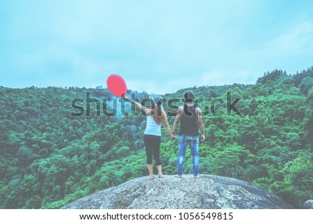 Lover women and men asian travel nature. Travel relax. Stand landscapes Natural Touch fog on the cliff rocks. Thailand Zdjęcia stock © 
