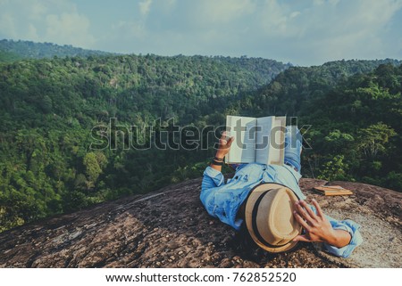 Image, Stock Photo Relaxed man reading notes in notebook