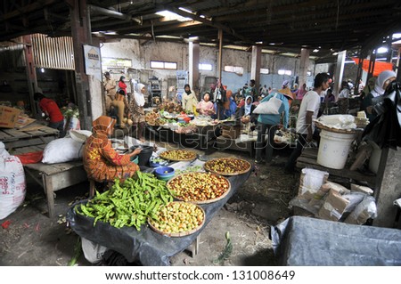 BALI - JUNE 23:  Market vendors selling vegetables on a market on June 23, 2011 in Bali, Indonesia. Indonesia ranks second worldwide in farm output. Agriculture employs 52.1% of the total workforce