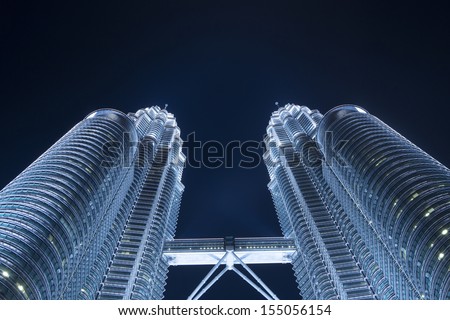 KUALA LUMPUR - MAY-3: View of The Petronas Twin Towers on May 3, 2013 in Kuala Lumpur, Malaysia. It is famous landmark of Malaysia. Petronas are the tallest twin buildings in the world (451.9 m).