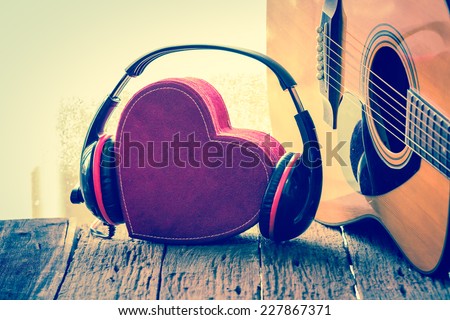 Headphones with red  heart. love music. vintage retro