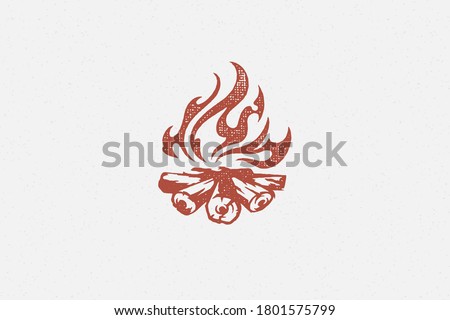 Red silhouette of hot campfire burning on logs on campsite hand drawn stamp effect vector illustration. Vintage grunge texture on old paper for poster or label decoration.
