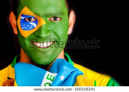 Brazilian man smiling - isolated over a black background