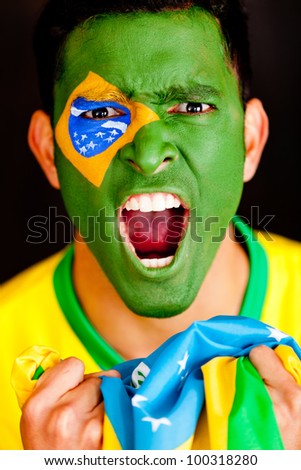 Brazilian man shouting - isolated over a black background