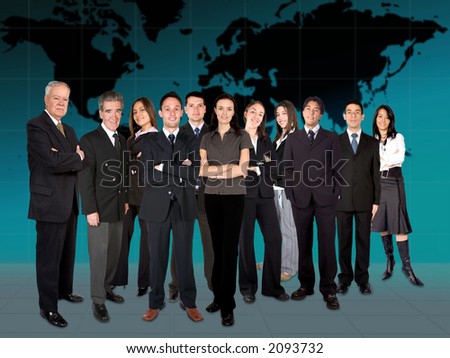 business team in front of a worldmap in the background