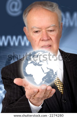 business man holding a globe on his hand