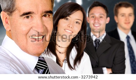 Business team in an office lead by a businessman