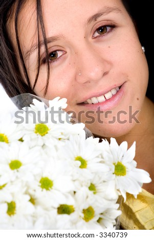 beautiful girl with white flowers smiling over a white background