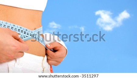 slim body - lose weight series - over a blue sky in the background