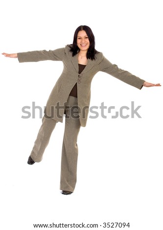 Business woman balancing and smiling over a white background