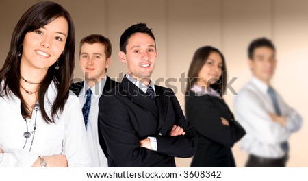 business team lead by a businesswoman in an office