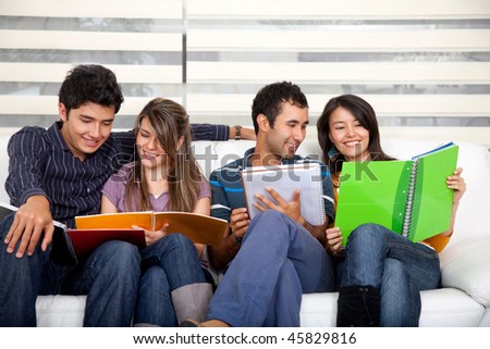 Group of young people studying at home