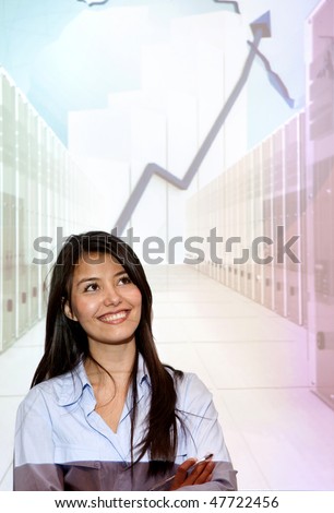 Business woman smiling in front of a company development projection