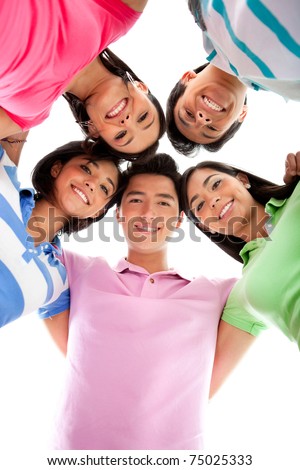 Happy group of friends in a circle - isolated over white