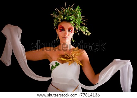 Portrait of a beautiful Greek goddess - isolated over black