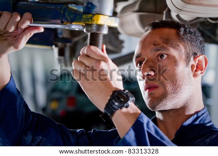 Mechanic Fixing A Car At The Garage Stock Photo 83313328 : Shutterstock
