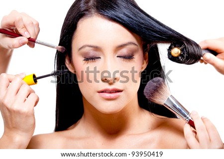 Woman getting professional styling - isolated over a white background