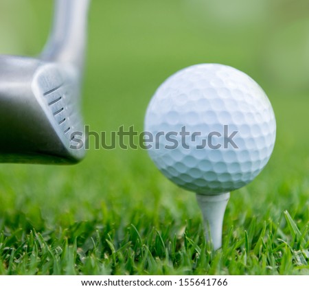 White golf ball at the tee box