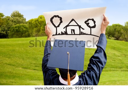 Graduate student picturing the future with a house
