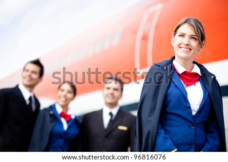 Portrait of an airplane cabin crew smiling