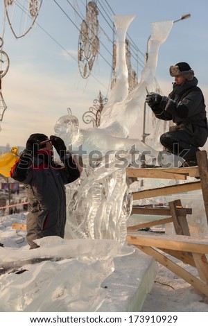 KRASNOYARSK, RUSSIA - JAN 17, 2014: Exhibition of paintings winter theme. Festival \