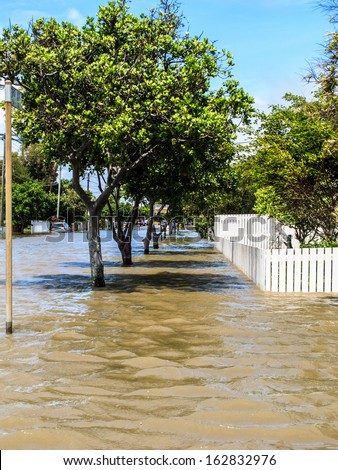 BRISBANE, QLD, AUSTRALIA - January 27: Flood waters covering the street in Sandgate, Brisbane on 27 January 2013