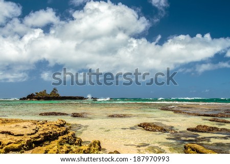 Kukaimanini is a small limestone island off the coast of Waialee Beach on the North Shore of Oahu, Hawaii