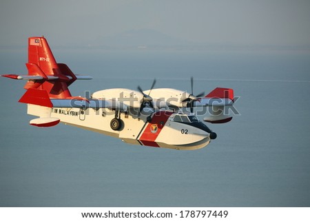 Penang Hill Fire. 26th February 2014. Profile of the Malaysian Maritime fire fighting aircraft. The same plane can be used for search and rescue missions in Malaysia. Can be seen flying above the sea