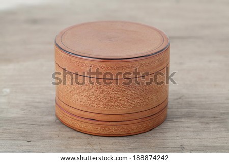 Antique lacquer wares on wooden table